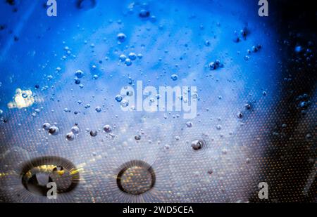 Golden abstract background with droplets. Stock Photo