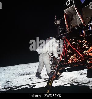 American astronaut Edwin E. Aldrin Jr., lunar module pilot, descending steps of lunar module ladder as he prepares to walk on moon during Apollo 11 extravehicular activity, photograph by Neil Armstrong, Johnson Space Center, NASA , July 20, 1969 Stock Photo