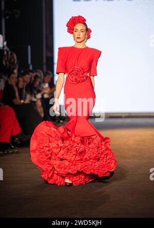 LORETO MARTÍNEZ presentó su colección de trajes de flamenca  en  Sevilla 2024 We Love Flamenco colección LORETO MARTINE Stock Photo