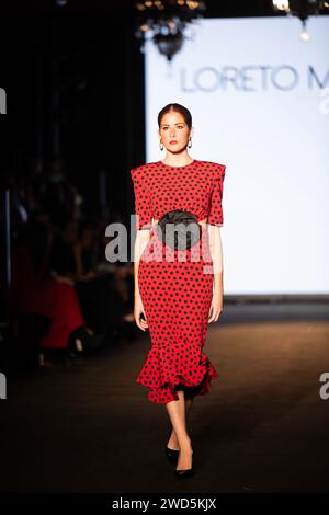 LORETO MARTÍNEZ presentó su colección de trajes de flamenca  en  Sevilla 2024 We Love Flamenco colección LORETO MARTINE Stock Photo