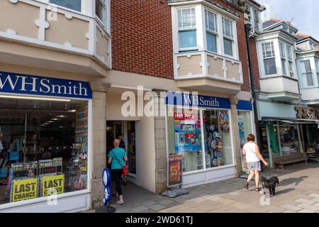 WH Smith retail store selling books, newspapers and stationery in Swanage town centre,Dorset,England,UK,2023 Stock Photo