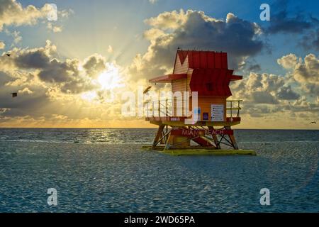 Brightly colored midcentury modern style lifeguard station along south beach in early morning sunshine Stock Photo