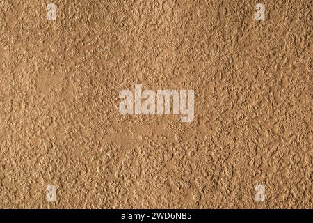 gold stucco concrete texture wall background detail design backdrop Stock Photo