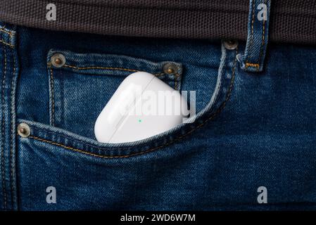 Antalya, Turkey - January 15, 2024: White wireless headphones Apple AirPods 3 Stock Photo