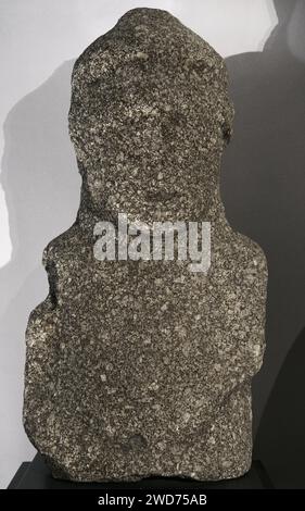 Statue representing a warrior. 1st century AD. Monte do Castro, Capeludos, Vila Pouca de Aguiar. Granite. National Archaeology Museum. Lisbon, Portugal. Stock Photo