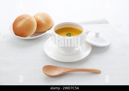 pumpkin potage soup isolated on table Stock Photo