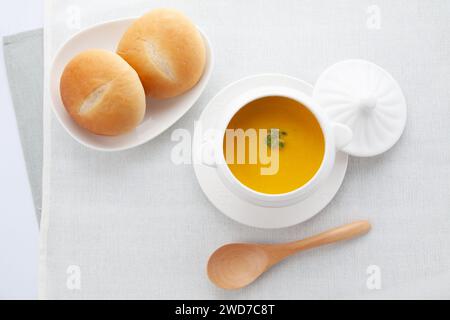 pumpkin potage soup isolated on table Stock Photo