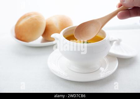 pumpkin potage soup isolated on table Stock Photo