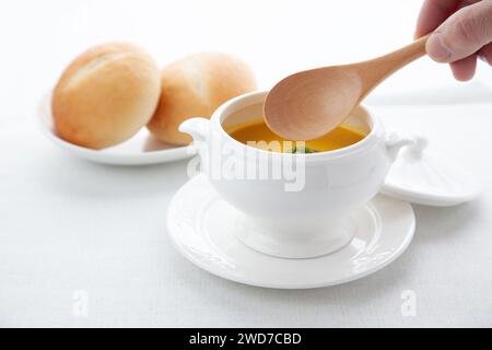 pumpkin potage soup isolated on table Stock Photo