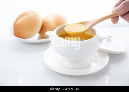 pumpkin potage soup isolated on table Stock Photo