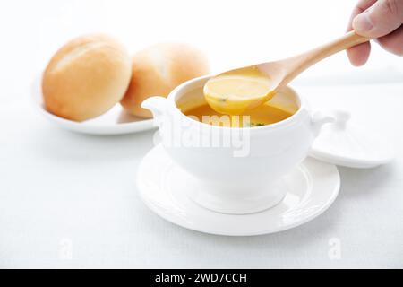 pumpkin potage soup isolated on table Stock Photo
