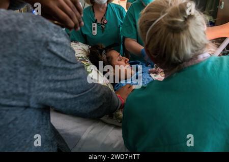 Indian mom weeps seeing baby right after birth Stock Photo