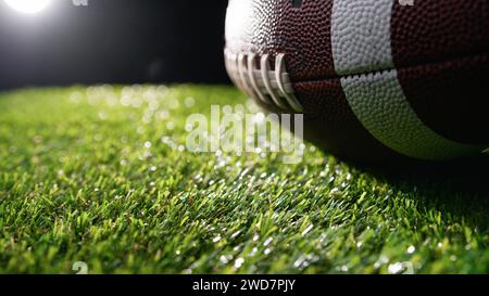 lights kissing the oval shape of a football ball Stock Photo