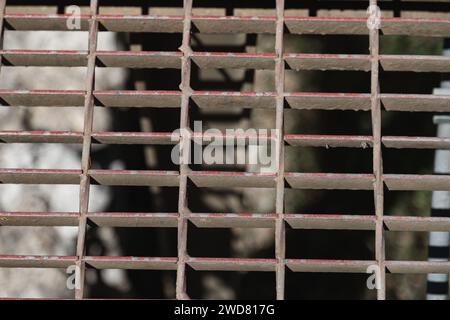Metal grates for draining water and waste. Rectangular pattern. Abstract image. Stock Photo