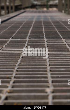 Metal grates for draining water and waste. Rectangular pattern. Abstract image. Stock Photo