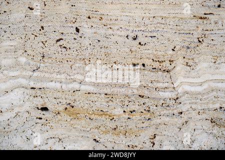 Detail of beige travertine marble wall tile porous texture Stock Photo