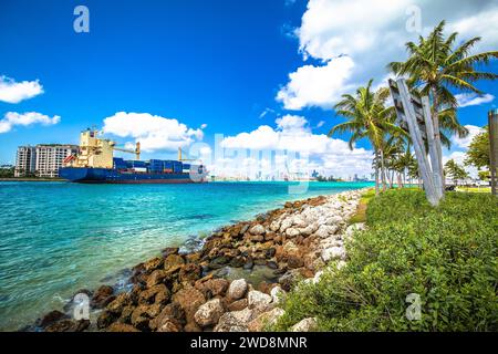 Container cargo ship entering the port of Miami through Government Cut channel, Florida state, USA Stock Photo