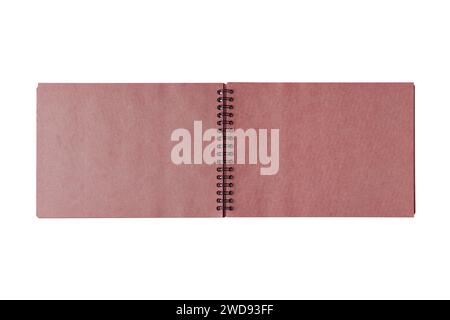 Open spiral bound notepad with two craft red sheets, isolated on white background. Top view, copy space for text, template, mockup Stock Photo