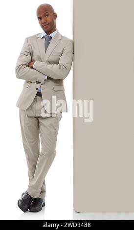 Businessman, portrait and leaning on wall in confidence with arms crossed on a white studio background. Young black man, African employee or Stock Photo