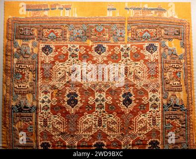 Examples of old historical Ottoman, Turkish, Middle Eastern and Iranian carpets and rugs Stock Photo
