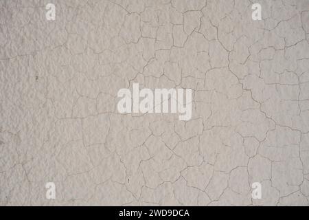Detail of old wall cracked limewash plaster coating texture Stock Photo