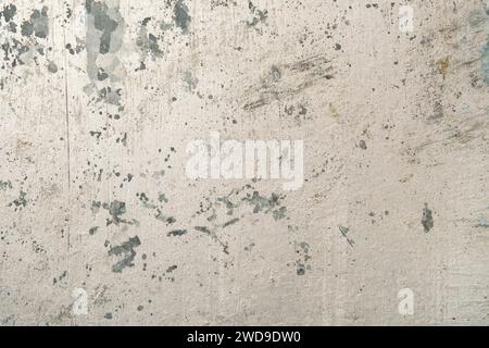 Detail of old scraped galvanized steel metal sheet with worn out white coating, grunge background Stock Photo