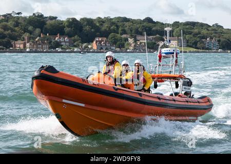 The Cowes Inshore Lifeboat Sheena Louise an Atlantic 85 RIB on duty in the Solent off the North coast of the Isle of Wight during a power boat race Stock Photo