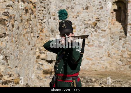 28th August 2023. Castle Rising, Norfolk, England. James Sturch (AKA Sergeant Sturch) of the 95th Rifles Living History Society in full kit ready for a Soldiers Through the Ages event at Castle Rising.  Interpreting the same 95th Rifles depicted in the Sharp TV series, James bares a striking resemblance to the actor Sean Bean who played the lead. Stock Photo