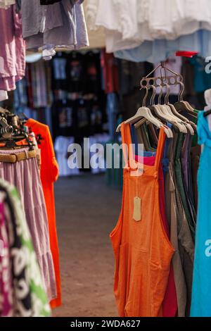 Womens summer dresses and clothes made of cotton fabric for sale in a traditional market in Alcudia, Mallorca, Spain Stock Photo