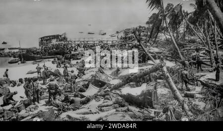 The aftermath of the storming of Tarawa Beach in the Gilbert Islands by U.S. Marines. The assault on 20th November 1943, on the islands during the Second World War was one of the bloodiest of the war with over a 1,000 Americans killed, many injured and 5,000 Japanese troops Stock Photo