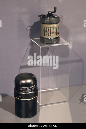 Curta II mechanical pocket calculator designed by Curt Herzstark. Made by Contina Ltd in Liechtenstein in 1961. Original case  Museum piece. Stock Photo