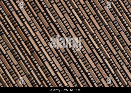 Abstract brown background of woven wooden napkin Stock Photo