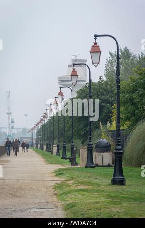 View of the beach promenade on a misty morning in the town of Honfleur, Normandy, France Stock Photo