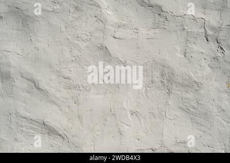 Old rustic limewashed wall plaster grunge background Stock Photo
