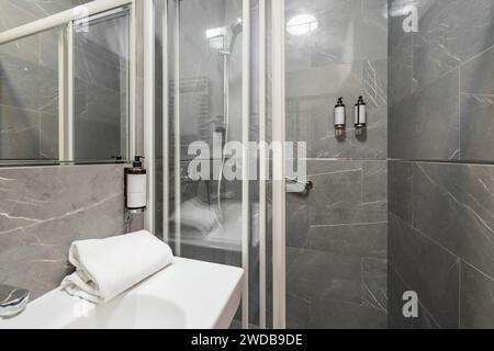 Gdansk, Poland - September 6 2023: Interior of hotel room for single and toilet of Impresja 3 star hotel at Aniolki district of Gdansk city Stock Photo