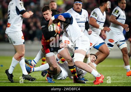 Gloucester's Seb Atkinson tackled by Castres Olympique's Geoffrey Palis and Florent Vanverberghe during the EPCR Challenge Cup match at the Kingsholm Stadium, Gloucester. Picture date: Friday January 19, 2024. Stock Photo