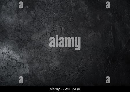 Dark textured concrete wall background. Copy space Stock Photo