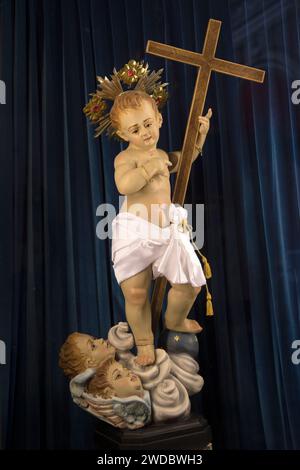 Polychrome Sculpture of the Christ Child carrying a cross in St Lawrence Church, Vittoriosa, Malta, Island of Malta,  2024, 2020s, HOMER SYKES Stock Photo