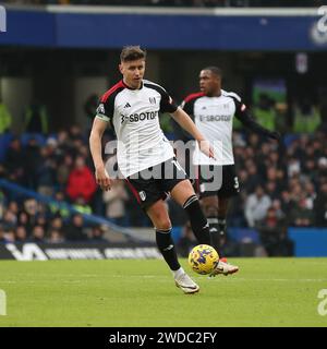 London, UK. 15th Jan, 2024. Tom Cairney of Fulham in action during the Premier League match between Chelsea and Fulham at Stamford Bridge, London, England on 13 January 2024. Photo by Ken Sparks. Editorial use only, license required for commercial use. No use in betting, games or a single club/league/player publications. Credit: UK Sports Pics Ltd/Alamy Live News Stock Photo