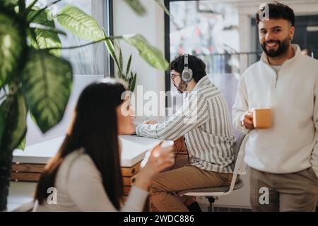 Diverse business team collaborating in office, brainstorming ideas, discussing strategies for success and business expansion. Stock Photo