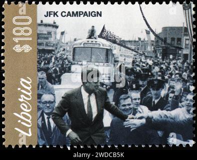 JFK during his campaign to be elected president on postage stamp Stock Photo