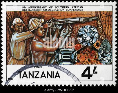 Mining diamonds on postage stamp from Tanzania Stock Photo