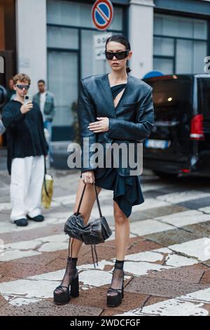 A guest outside Roberto Cavalli show during Milan Fashion Week ...
