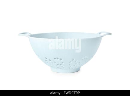 New plastic colander isolated on white. Cooking utensils Stock Photo