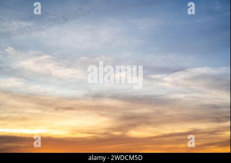 Panoramic beautiful colorful golden hour twilight sky. Beautiful cloud and sky nature background in magic hour. Amazing colorful sky and dramatic suns Stock Photo