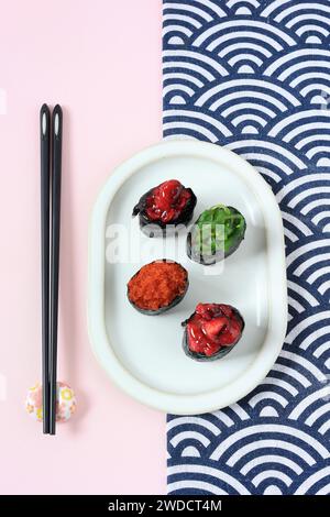 Top View Gunkan Sushi Japanese Food on Oval Plate Stock Photo