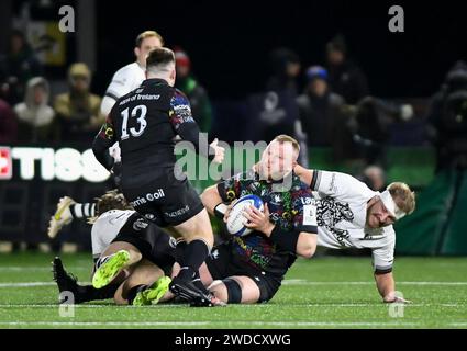 Galway, Ireland. 19th Jan, 2024. Joe Joyce of Connacht attempts to offload the ball while under pressure during the first half Credit: Don Soules/Alamy Live News Stock Photo