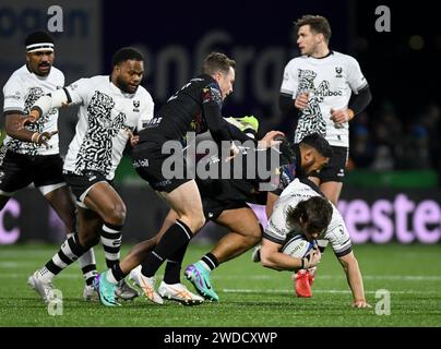 Galway, Ireland. 19th Jan, 2024. Benhard Janse van Rensburg tackled by Connacht's Bundee Aki Credit: Don Soules/Alamy Live News Stock Photo