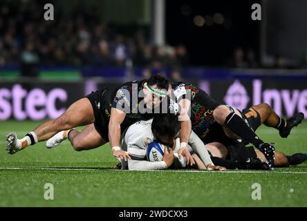 Galway, Ireland. 19th Jan, 2024. Steven Luatua of Bristol Bears is tackled by Denis Buckley and Joe Joyce of Galway Credit: Don Soules/Alamy Live News Stock Photo