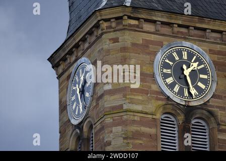 Clock tower of the Romanesque style Église Saints-Pierre-et-Paul a religious monument of the picturesque village Rosheim in Alsace, France. Stock Photo